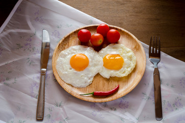 Fried egg on dish 