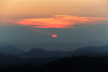 Landscape of dawn coming in top of mountain.
