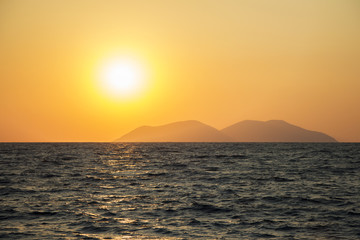 Fototapeta na wymiar Beautiful sunset over the ocean. Sunrise in the sea