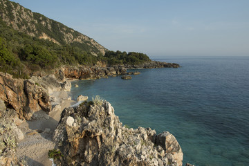 Fototapeta na wymiar The Wild and Rocky Coast near Village of Corniglia in Cinque Terre, Italy