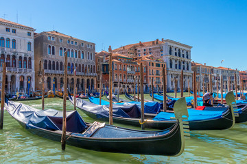 Fototapeta na wymiar Gondolas in the Grand Canal of Venice, Italy