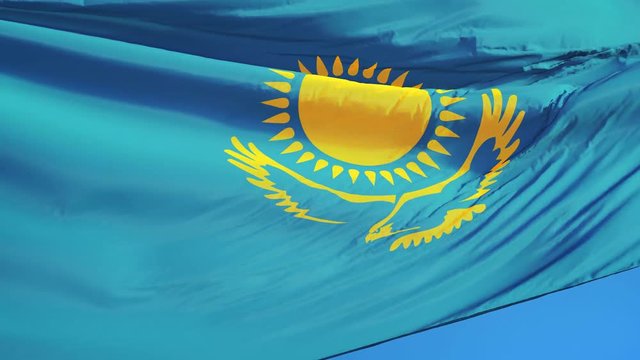 Kazakhstan flag waving in slow motion against clean blue sky, seamlessly looped, close up, isolated on alpha channel with black and white luminance matte, perfect for film, news, digital composition