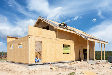 Construction or repair of  house with insulation, eaves, windows, garage,chimney, roofing, fixing facade and plastering 