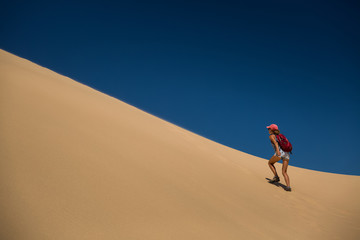 Fototapeta na wymiar Hiker in the desert