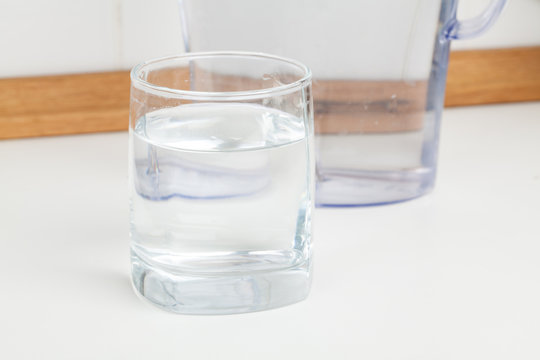 glass of water on a kitchen table