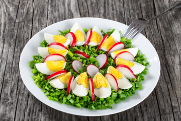 Spring onion, eggs, radish salad, close up