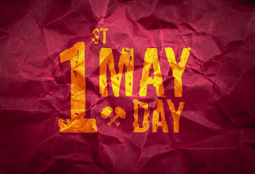 1 May day (International Labor day) on red crumpled paper texture,holiday concept