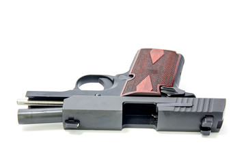 slide hold and ejection port of pistol isolated on white backgro