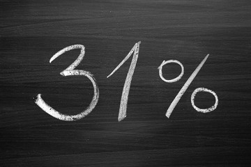 31 percent header written with a chalk on the blackboard