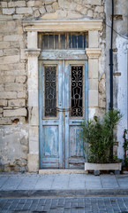 Fototapeta na wymiar Old door, vintage decorative lattice in Cyprus