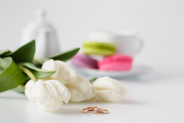 Fototapeta na wymiar Delicious sweet cupcakes with spring tulips