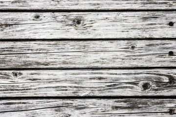 Gray wooden desks background.