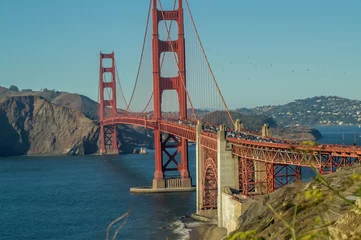 Photo sur Plexiglas Plage de Baker, San Francisco Rush hour on the Golden Gate bridge, San-Francisco,USA ,view  from Baker beach,