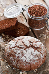 Bread and jar with buckwheat
