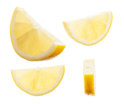 Slice of fresh lemon isolated on white background.