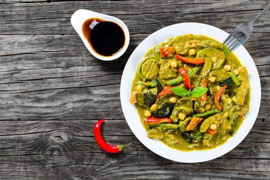 vegetarian curry with zucchini, eggplants, carrots, bell pepper,
