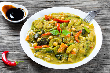 vegetarian curry with zucchini, eggplants, carrots, bell pepper,