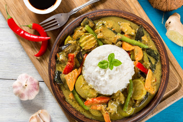 vegetarian curry with rice, coconut, ginger, soy sauce top view