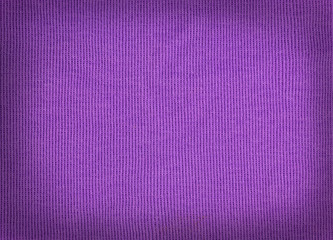 knitted woolen fabric purple. wool texture.