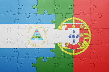 puzzle with the national flag of portugal and nicaragua