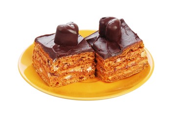 Chocolate cakes on orange plate