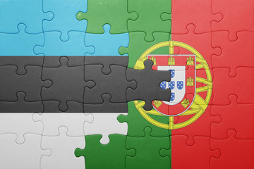 puzzle with the national flag of portugal and estonia