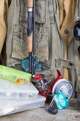 fishing tackles with fishing vest and boots