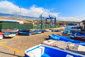Fototapeta na wymiar Fishing boats in dockyard in San Juan port, Tenerife, Canary Islands, Spain
