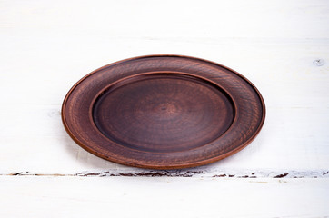 plate on white wooden table