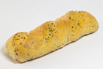 Bread with sunflower seeds and sesame seeds on a white backgroun