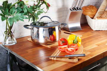 tomatoes on a wooden board knife kitchen countertops, interior, pan, hob, cooker