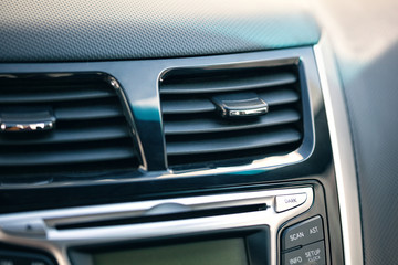 Obraz na płótnie Canvas Air conditioner. the air flow inside the car. detail interior of car