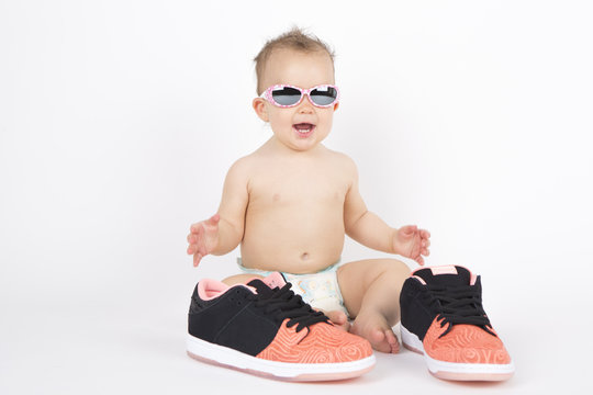 Baby with sneakers