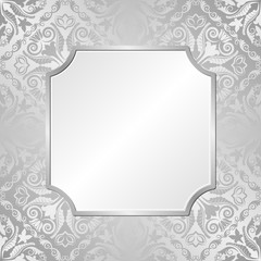 silver background with antique ornaments and frame