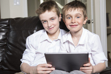 Children playing with tablet pc