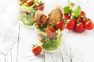 Vegan salad with tomato, lettuce and bread