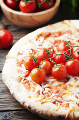 Italian homemade pizza margherita with tomato and mozzarella