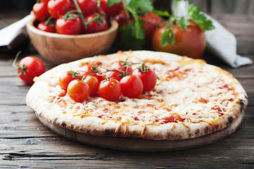 Homemade Italian pizza margherita with tomato
