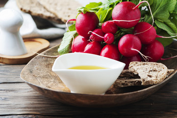 Fresh red radish with olive oil