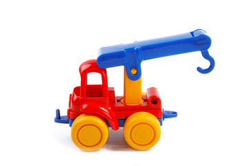 Children's toy the car-crane isolated