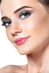 face of young woman with bright make-up. Beauty portrait