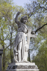 Fototapeta na wymiar Angel and cross monument