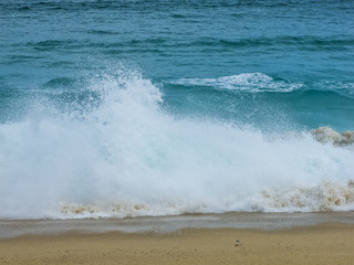View of Waves at Sandy Beach of Cabo San Lucas in Mexico