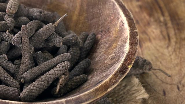 Portion of rotating Long Pepper as not loopable 4KUHD footage