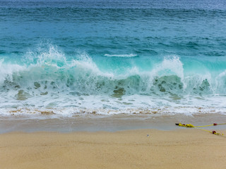 View of Waves at Sandy Beach of Cabo San Lucas in Mexico