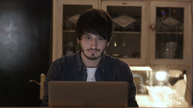 Young Entrepreneur Freelancer Working using a Laptop and in Coworking