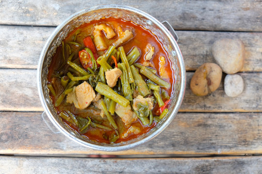 Pork curry with water spinach (Tae-pho soup) in tiffin carrier