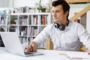 Fototapeta premium Young businessman in office