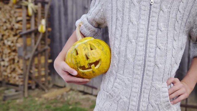 Pumpkin Head With Face Under Arm