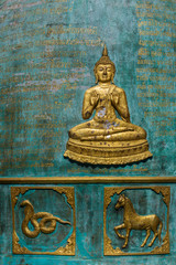 Golden Buddha on a Big Temple Bell at Wat Phra Sing - Chiang Rai